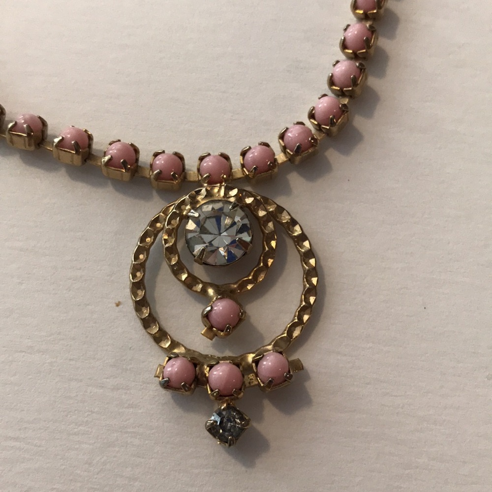 Pink and gold tone necklace